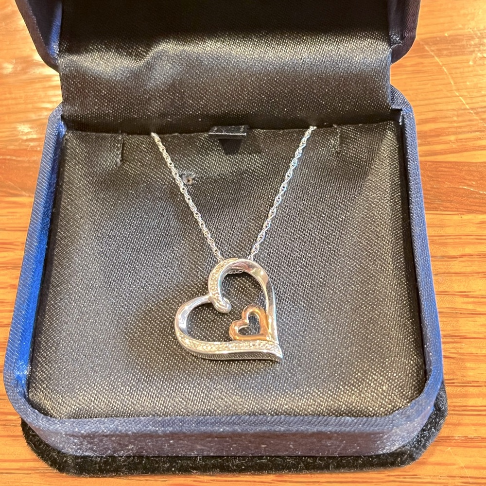 Diamond accent tilted double heart pendant in sterling silver and 10K rose gold